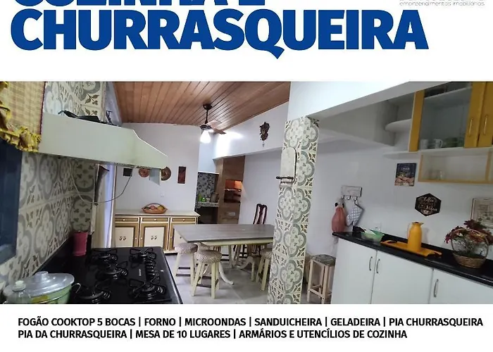 Casa com piscina, churrasqueira, 3 suítes com ar condicionado